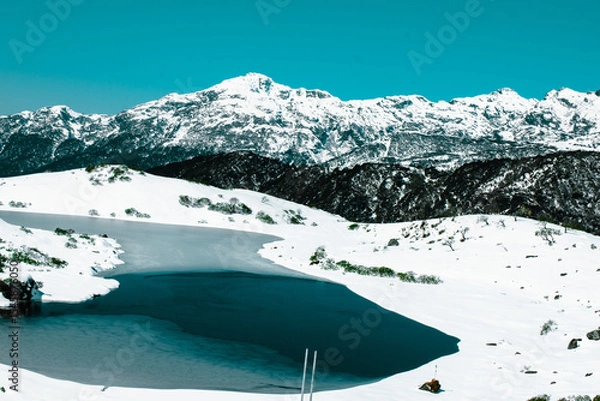 Obraz lake in snow covered mountains