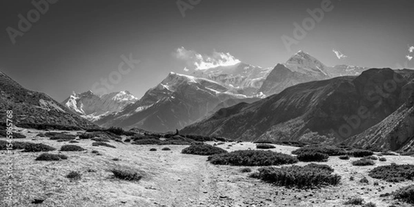 Obraz Thorung Khola gorge against snowy Gangapurna and Annapurna III peaks. Himalaya mountains, Nepal.
