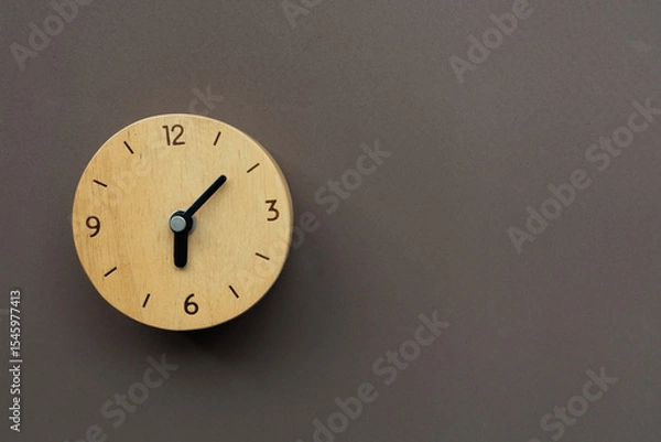 Fototapeta Retro alarm clock on brown table background, vintage style, flat lay