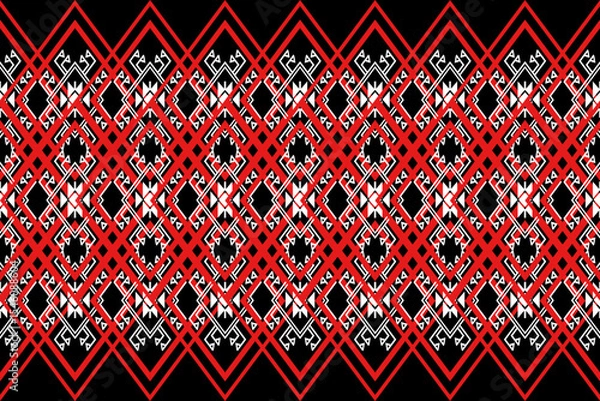 Fototapeta A seamless pixel art pattern inspired by traditional Phrae silk weaving from Thailand. Featuring bold red diamond shapes, intricate white geometric lines, and black tribal accents, this design reflect