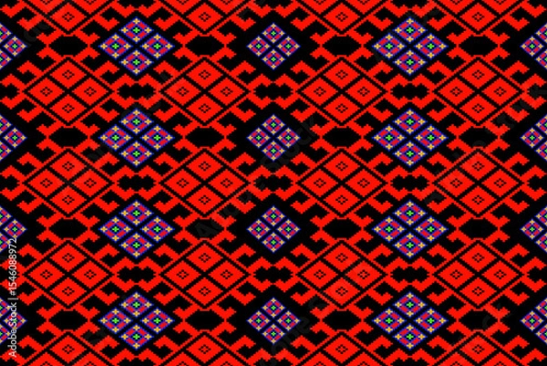 Fototapeta A vivid and colorful pixel art pattern inspired by traditional Thai Praewa weaving from the Isan region. The vibrant orange base is complemented with blue, purple, green, and white geometric motifs ar