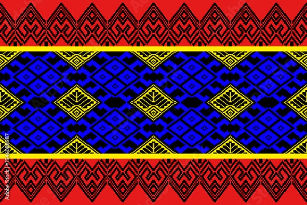 Fototapeta A vibrant traditional Thai Praewa textile pattern illustrated in bold pixel art style. Features a symmetrical geometric layout with diamond motifs in vivid red, blue, yellow, and black. Inspired by No