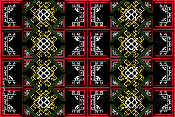 Fototapeta This seamless pixel art textile design is inspired by traditional Southeast Asian weaving, featuring symmetrical yellow diamond motifs, red cross-style frames, and geometric tribal patterns. The intri