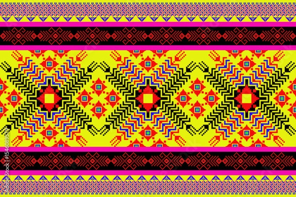Fototapeta  Vibrant pixel textile inspired by northeastern Thai (Isan) weaving traditions. The bold central sunburst motif radiates out in pixelated zigzag waves, using yellow, red, black, and electric blue. A 