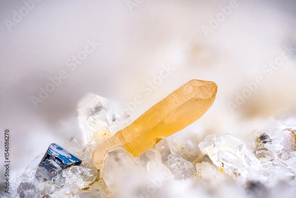 Obraz Yellow Synchysite-(Ce) (a rare earth mineral containing Cerium) with black Anatase on Quartz. Specimen from Les crevasses, Jarrier, Alpes, France. Micro photography extreme close-up. 