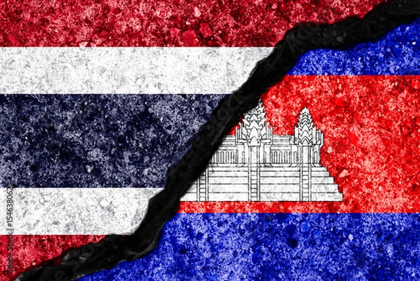 Fototapeta Wall crack separate between Thailand flag and Cambodia flag for government conflict from border of both countries concept.