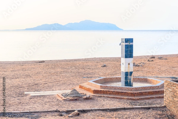 Obraz An old beach shower on the grounds of an abandoned hotel on the Red Sea coast