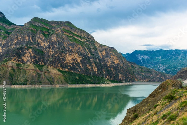 Obraz Picturesque landscape with mountain lake and layered beautiful mountains of the North Caucasus Dagestan Russia