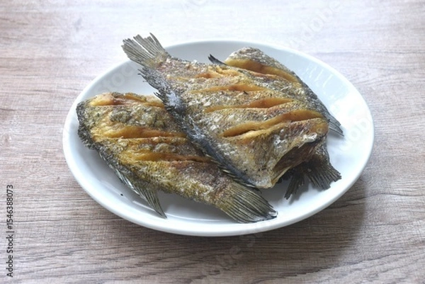 Obraz deep fried snake skin catfish or gourami arranging on dish  