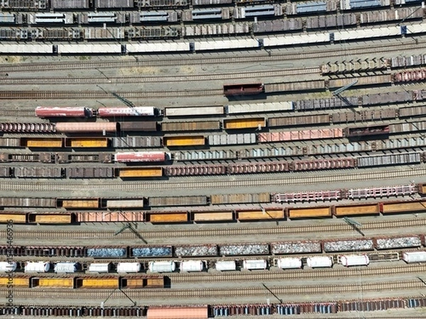 Fototapeta a freight station with many trains - aerial view