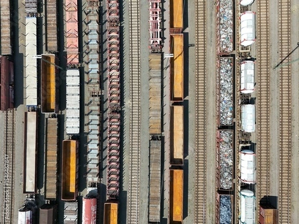 Fototapeta a freight station with many trains - aerial view
