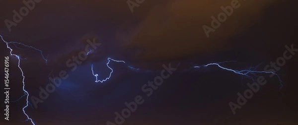 Obraz Lightning discharge during a hurricane over a night city. Concept on the theme of natural phenomena, weather, etc.
