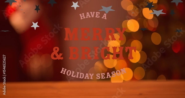 Fototapeta Projecting festive greeting text over wooden tabletop, with decorative stars and blurred lights