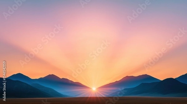Fototapeta sunburst Sunset sunburst behind distant mountains, casting warm hues across the sky.