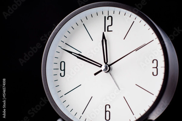 Fototapeta Clocks tell the time of work and life, processes and rules of limited time. Photo of clock in studio.