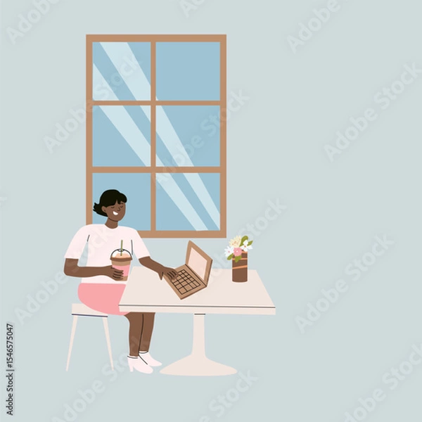 Fototapeta Relaxed coffee break with laptop in minimalist cafe setting.