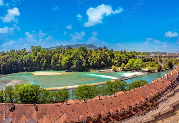 Fototapeta Panoramic view of the  Mattenschwelle, a weir providing water for the Matte hydroelectric power plant to the south of the old city of Bern, Switzerland