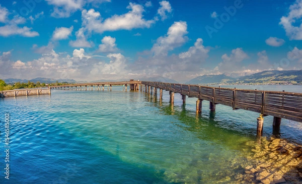 Fototapeta Holzbrücke Rapperswil-Hurden, the longest wooden bridge in Switzerland spanning the narrowest and shallowest part of Lake Zurich.