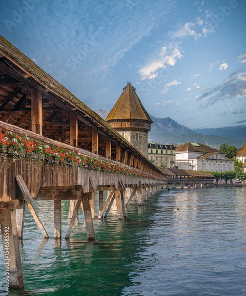 Fototapeta The world famous Kappelbrücke (Chapel Bridge) and its Wasserturm (water tower), Luzern (Lucerne), Switzerland