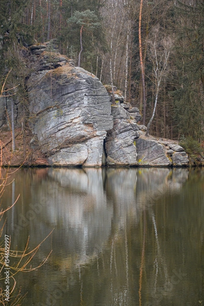 Obraz Rock formation reflecting in Vezicky pond at Troskovice, Bohemian Paradise nature reserve, Czech Republic