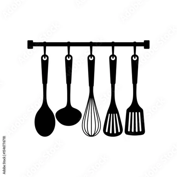 Fototapeta Kitchen Utensil Rack: A stylish set of five essential kitchen utensils neatly hangs on a rack, ready for culinary adventures.  