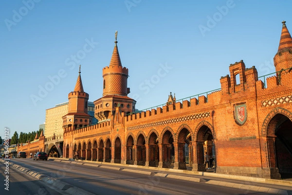 Fototapeta Oberbaum Bridge on soft sunset light in Berlin. Centre focus on the tower