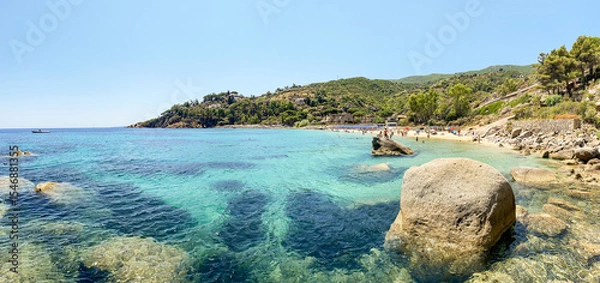 Obraz View to Cannelle beach, Spiaggia delle Cannelle, near Giglio Porto with view to mediterranean sea and beautiful blue bay at Isola del Giglio, island of the tuscan archipelago, Grosseto Tuscany Italy