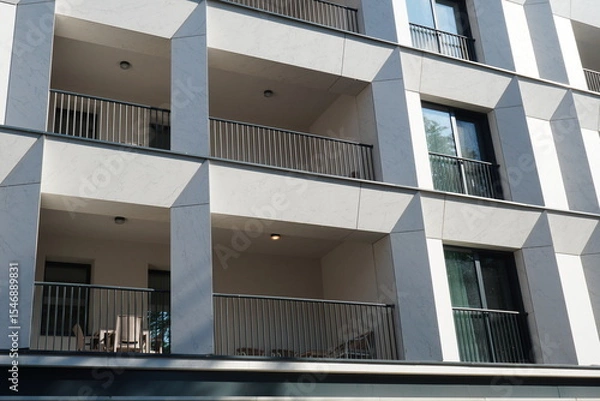 Fototapeta Facade of block of apartments in Bucharest, with balconies and windows