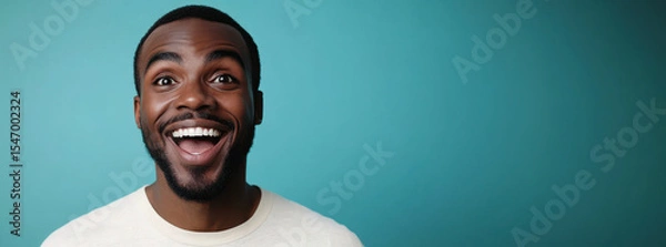 Obraz Cheerful Black Man Smiling in White Shirt
