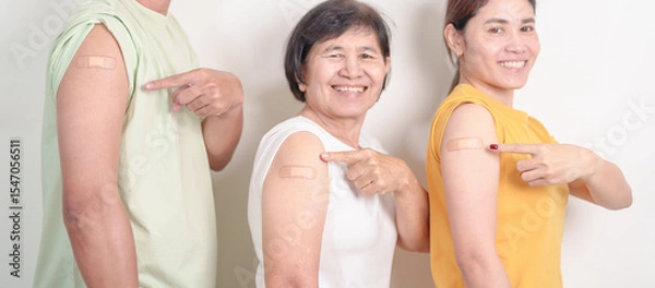 Fototapeta Adult and Senior group with bandage after received vaccine. Vaccination and Immunization for Influenza, HPV, Zoster, IPD, DTP, Dengue, Encephalitis, Rabies, Pneumococcal Hepatitis B and Covid vaccines
