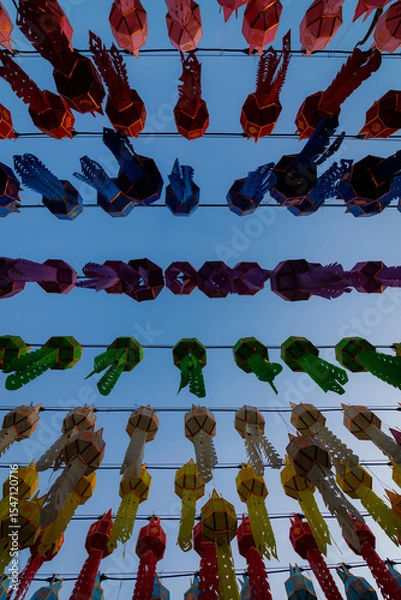 Obraz Colorful Lanna paper lanterns hang in Lamphun temples. Popular lantern festival during Loy Krathong in northern Thailand. Traditional Yi Peng paper lantern.