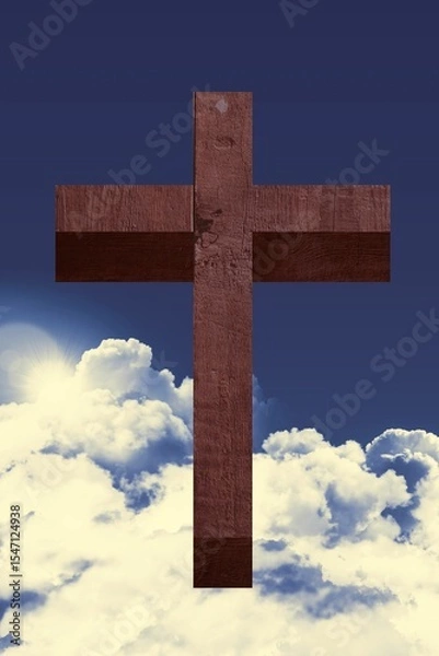 Fototapeta Wooden cross standing against deep blue sky with shining sunlight and glowing clouds in flat design