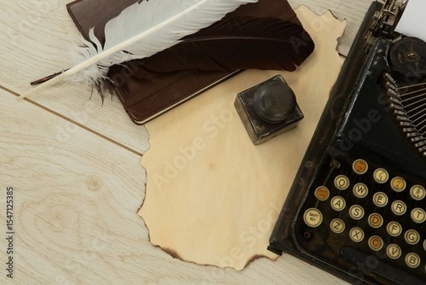 Fototapeta Typewriter, feathers and stamp on table
