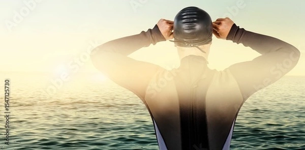 Fototapeta Rear view of swimmer against sea