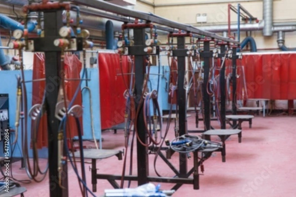 Obraz Empty assembly line in illuminated industry
