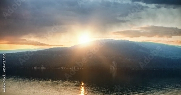 Obraz River by mountain against sky