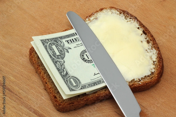 Obraz Butter and money on bread