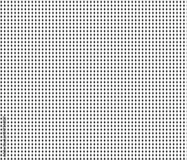 Obraz A dense grid of evenly spaced black dots on a white surface.