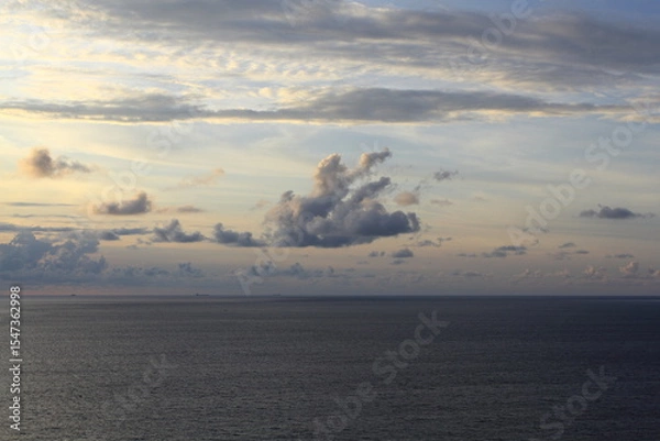 Fototapeta Cloudy afternoon sky over the sea. Lombok island, West Nusa Tenggara, Indonesia.
