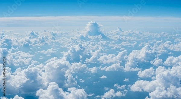 Fototapeta Aerial Panorama of Cumulus Cloudscape Under a Vivid Azure Sky