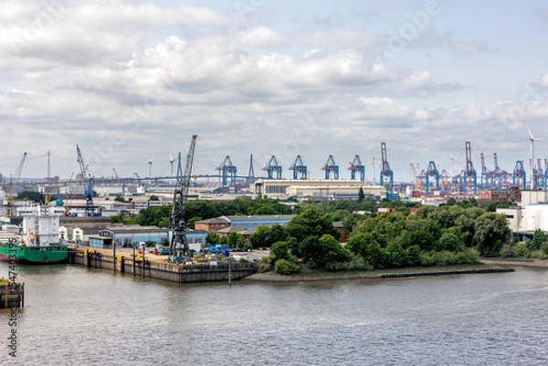 Obraz Industrial harbor. Port cranes. Maritime infrastructure.