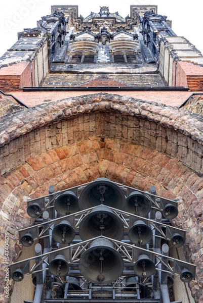 Obraz Bells in gothic arch. Upward view. Historic tower