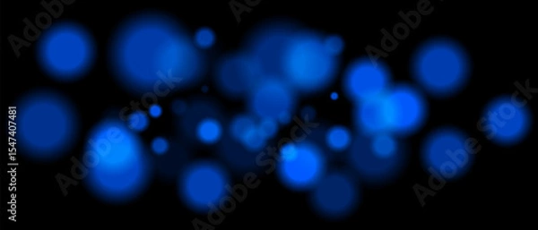 Obraz Blue blurred bokeh particles with varying size and opacity on black background. Abstract design element for festive or sci-fi scenes.