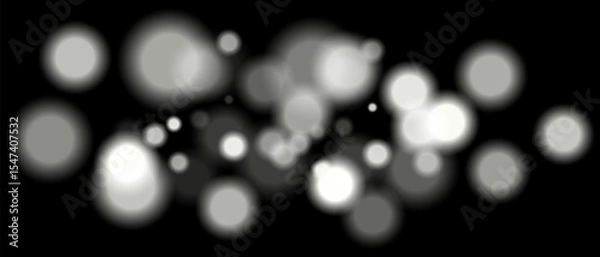 Fototapeta White blurred bokeh particles with varying size and opacity on black background. Abstract design element for festive or sci-fi scenes.