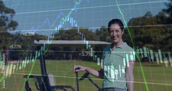 Obraz Standing woman golfer holding golf cart at golf course, with financial chart overlay, copy space