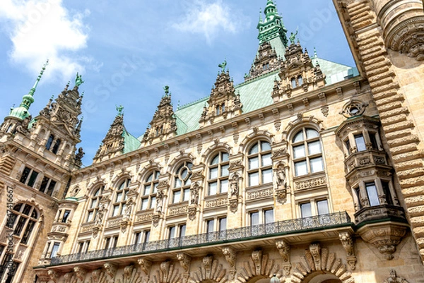 Obraz Historic European architecture. Ornate facade. Green spires