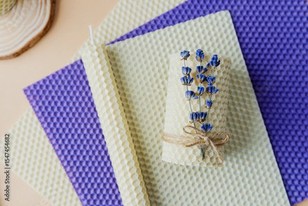 Obraz Lavender bunch and beeswax sheet prepared for candle making