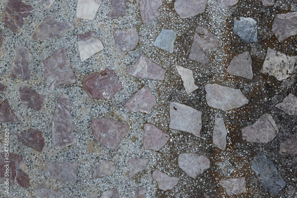 Fototapeta Natural texture of old concrete wall with stone inclusions