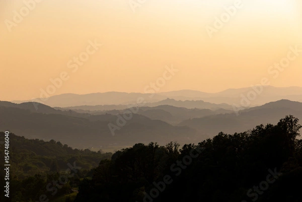 Fototapeta Evening sky over low mountains in western Serbia. Summer evening.