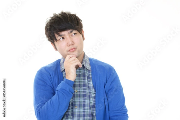 Obraz 考える若い男性